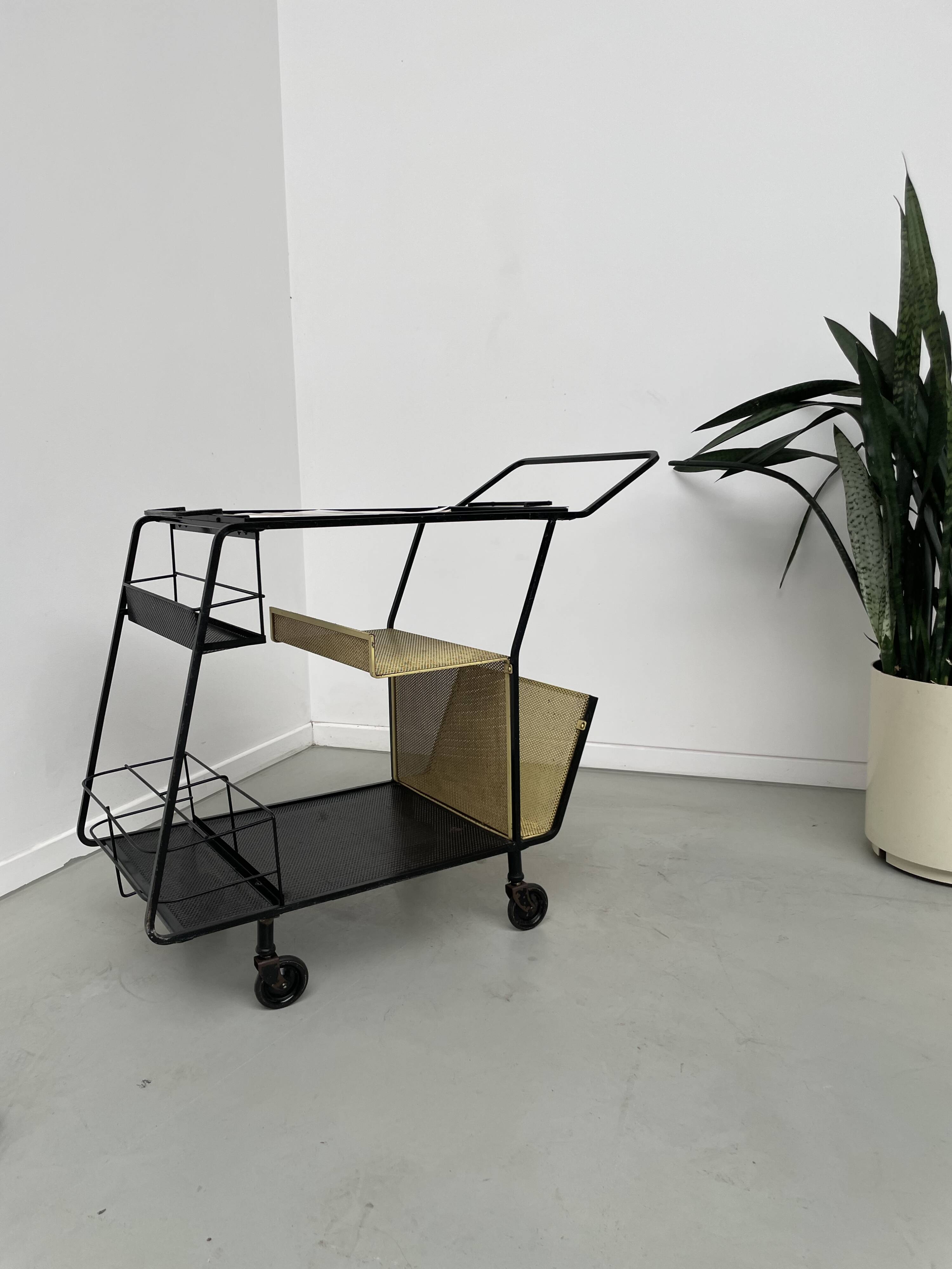 Perforated metal serving trolley in the Mathieu Matégot style