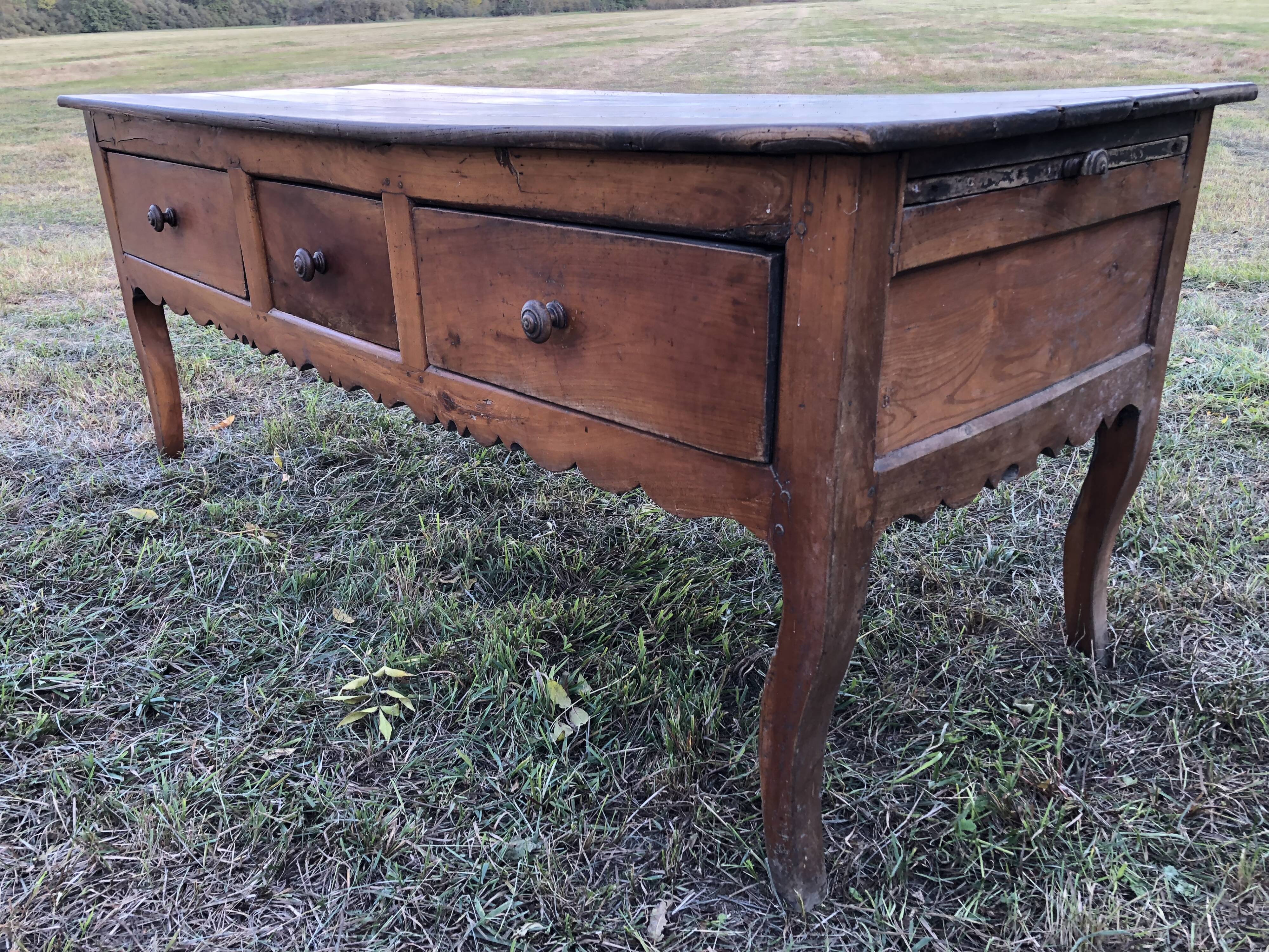 Antique Louis XV paneled table with 3 front drawers in solid cherry wood