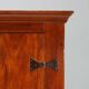 Vintage walnut wardrobe with exposed hardware.