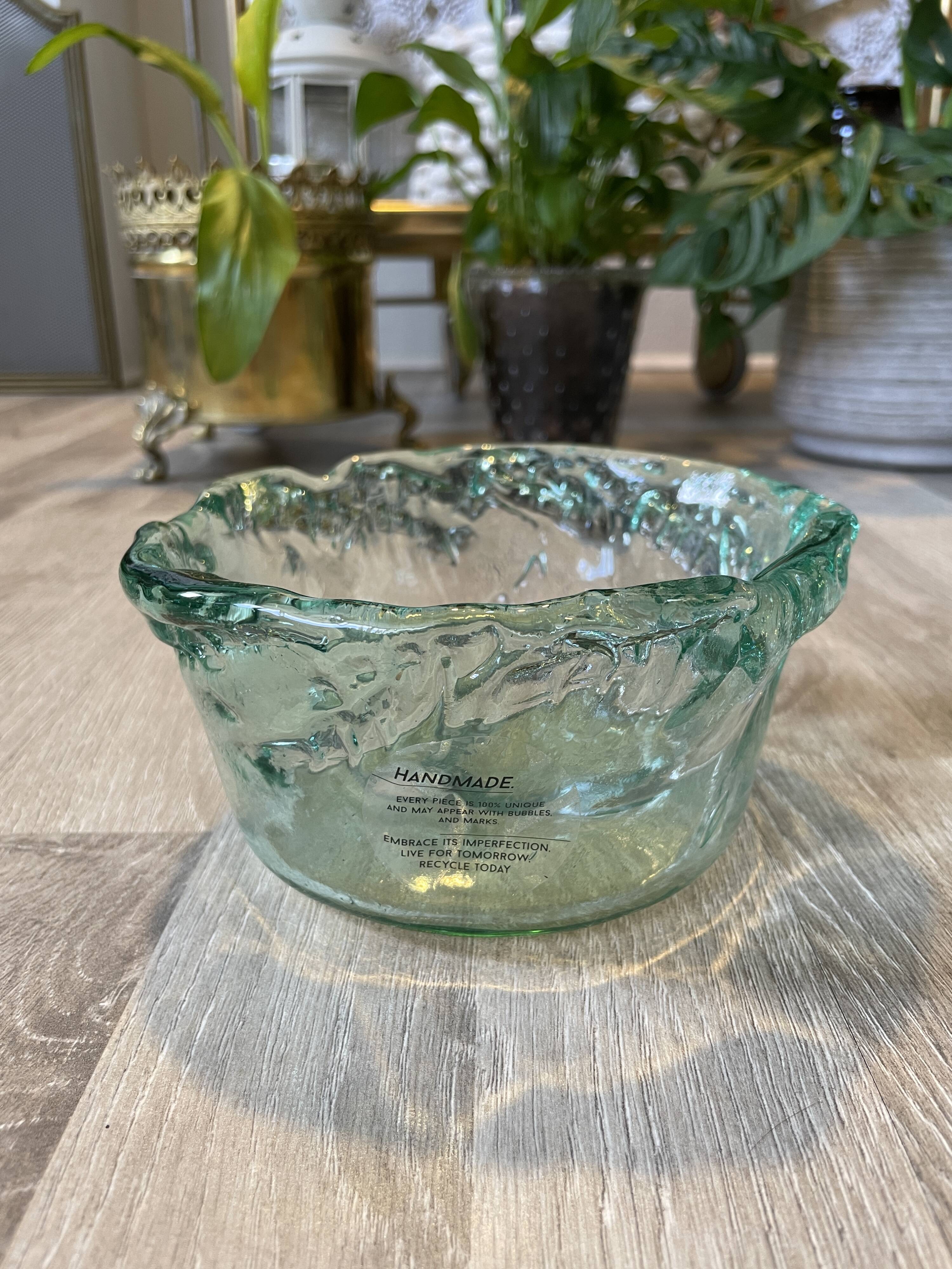 Small, free-form, organic glass jar