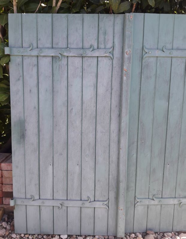 Pair of wooden iron hanging shutters