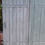 Pair of wooden iron hanging shutters