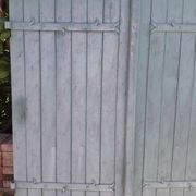 Pair of wooden iron hanging shutters