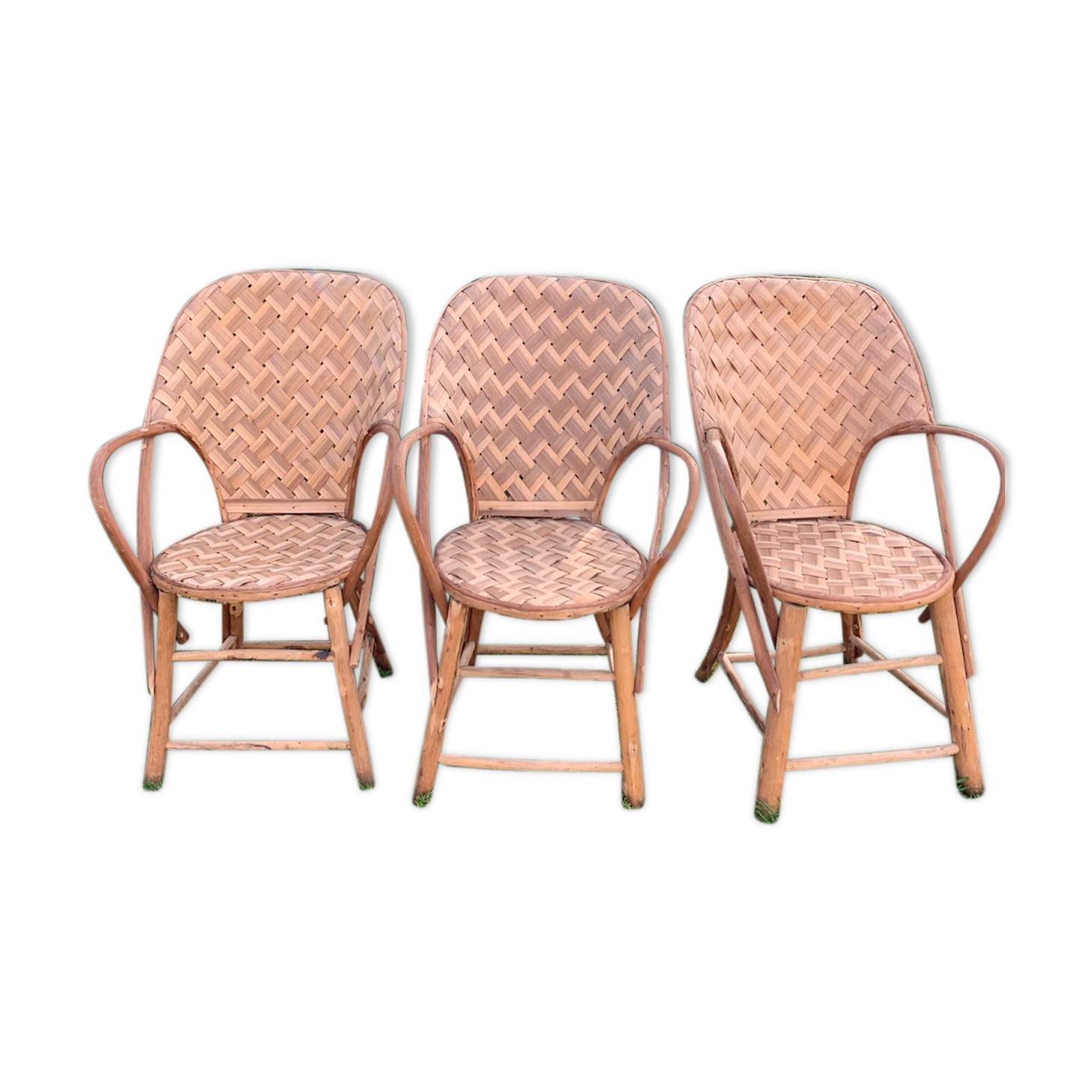 Trio of braided chestnut chairs