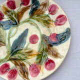 Very old barbotine plate with cherries