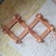 Wall-mounted accordion coat rack in solid pine