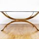Italian coffee table in smoked glass and brass