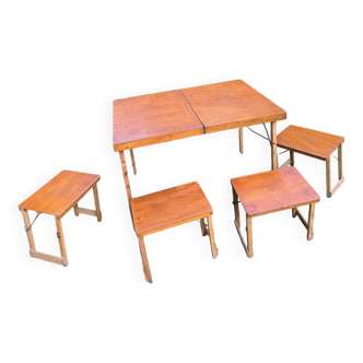 Old suitcase, table and stools, vintage wooden picnic