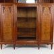 Art Deco showcase bookcase in carved walnut, France, circa 1925