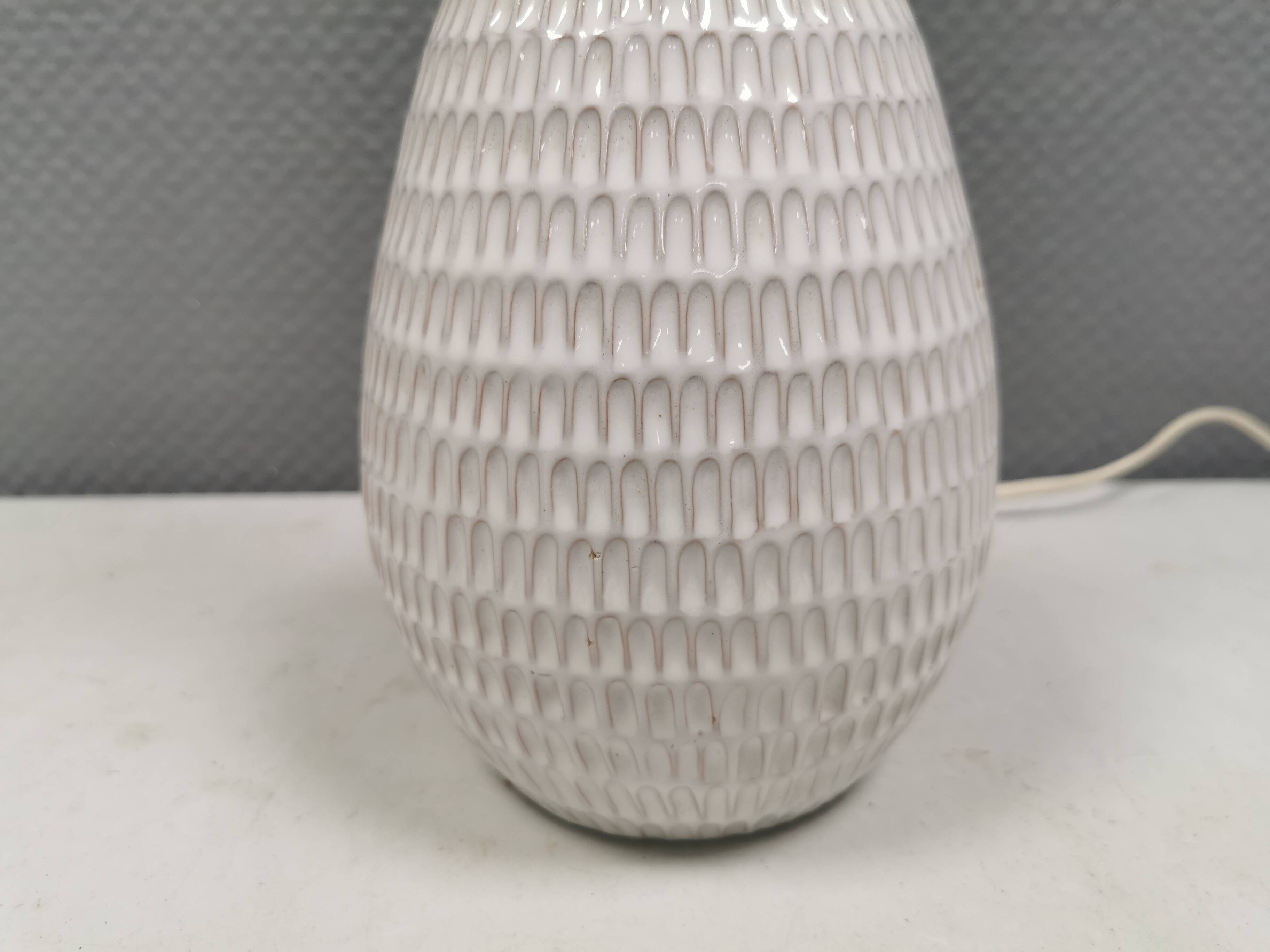 Older ceramic table lamp with beautiful details.