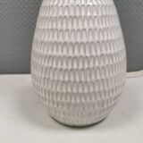 Older ceramic table lamp with beautiful details.