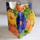 Ceramic vase pitcher decorated with flowers