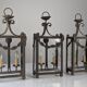 Wrought iron lantern with glass panels, leaf motifs