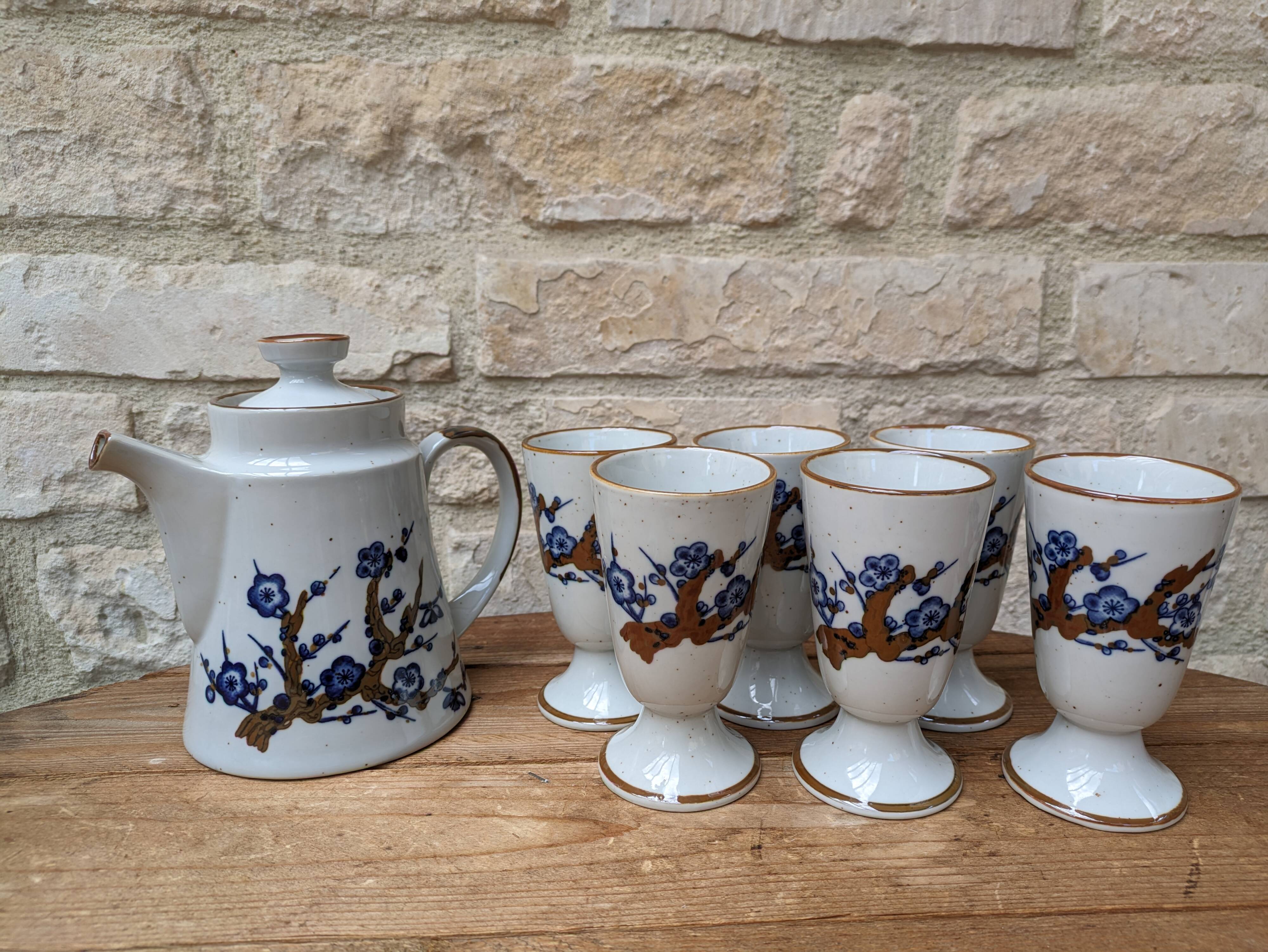 Old coffee service with 6 mazagrans and coffee pot with blue floral decoration