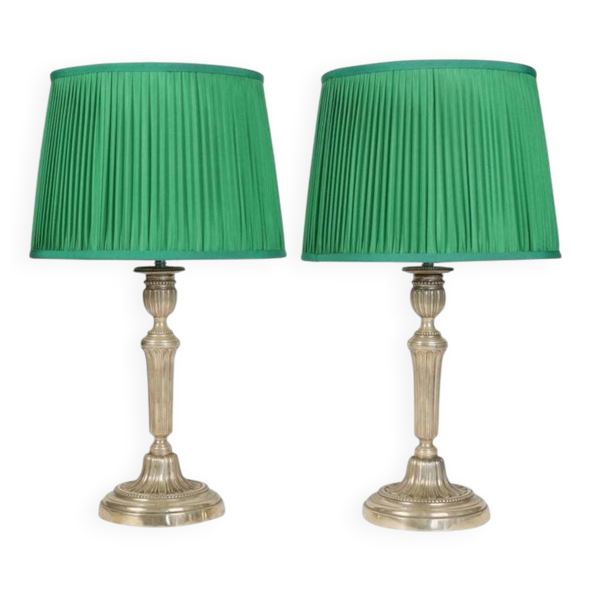 Candlesticks mounted as lamps, silver-plated bronze.