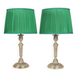 Candlesticks mounted as lamps, silver-plated bronze.