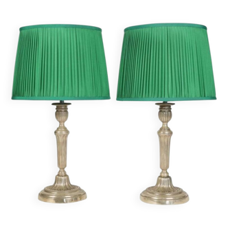 Candlesticks mounted as lamps, silver-plated bronze.