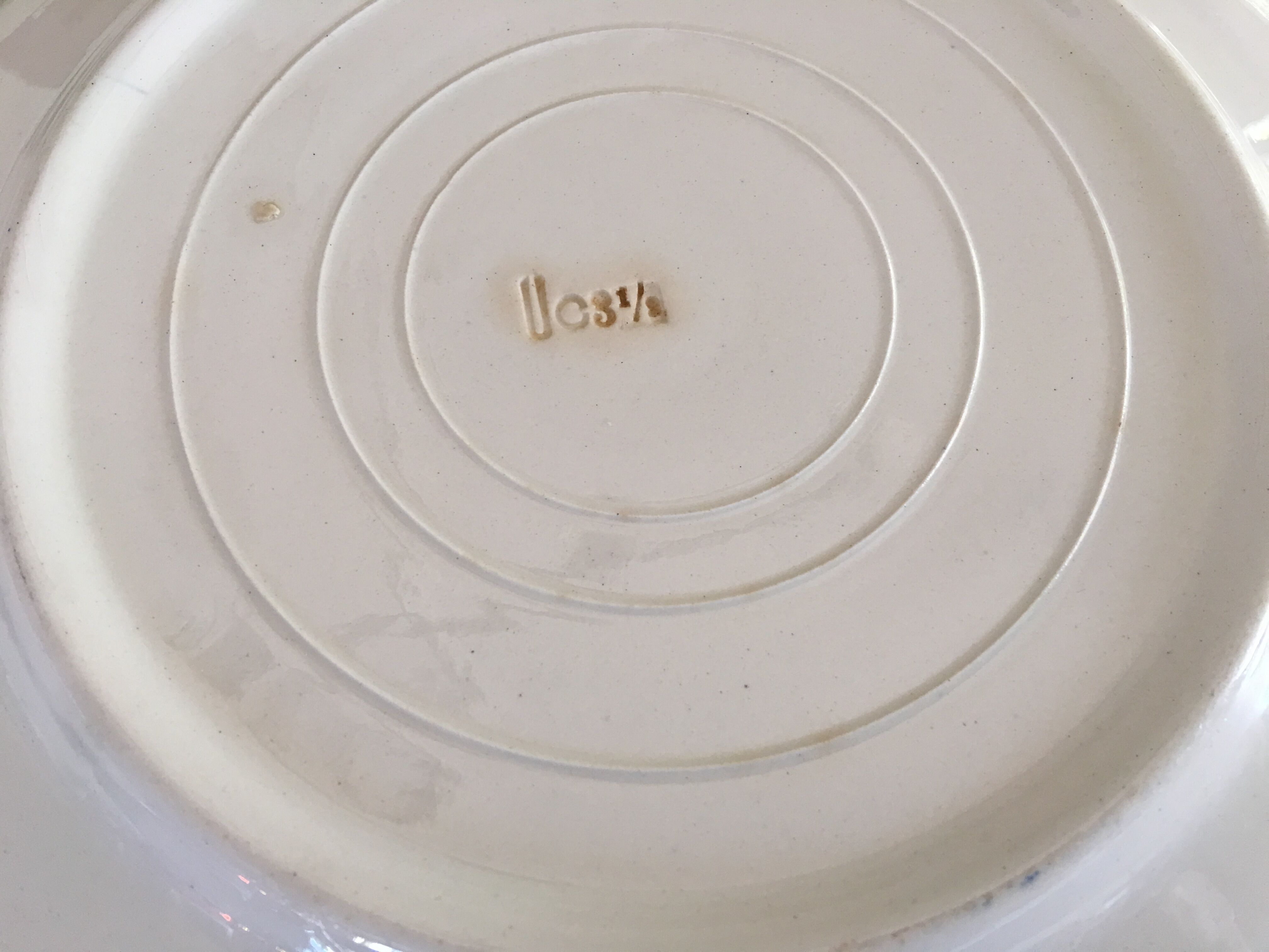 Series of 11 flat plates, Dutch earthenware, early XX