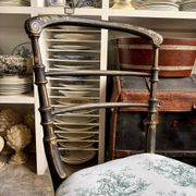Napoleon III chair in blackened wood and green toile de Jouy.