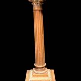 Bronze candle holder with floral motifs.