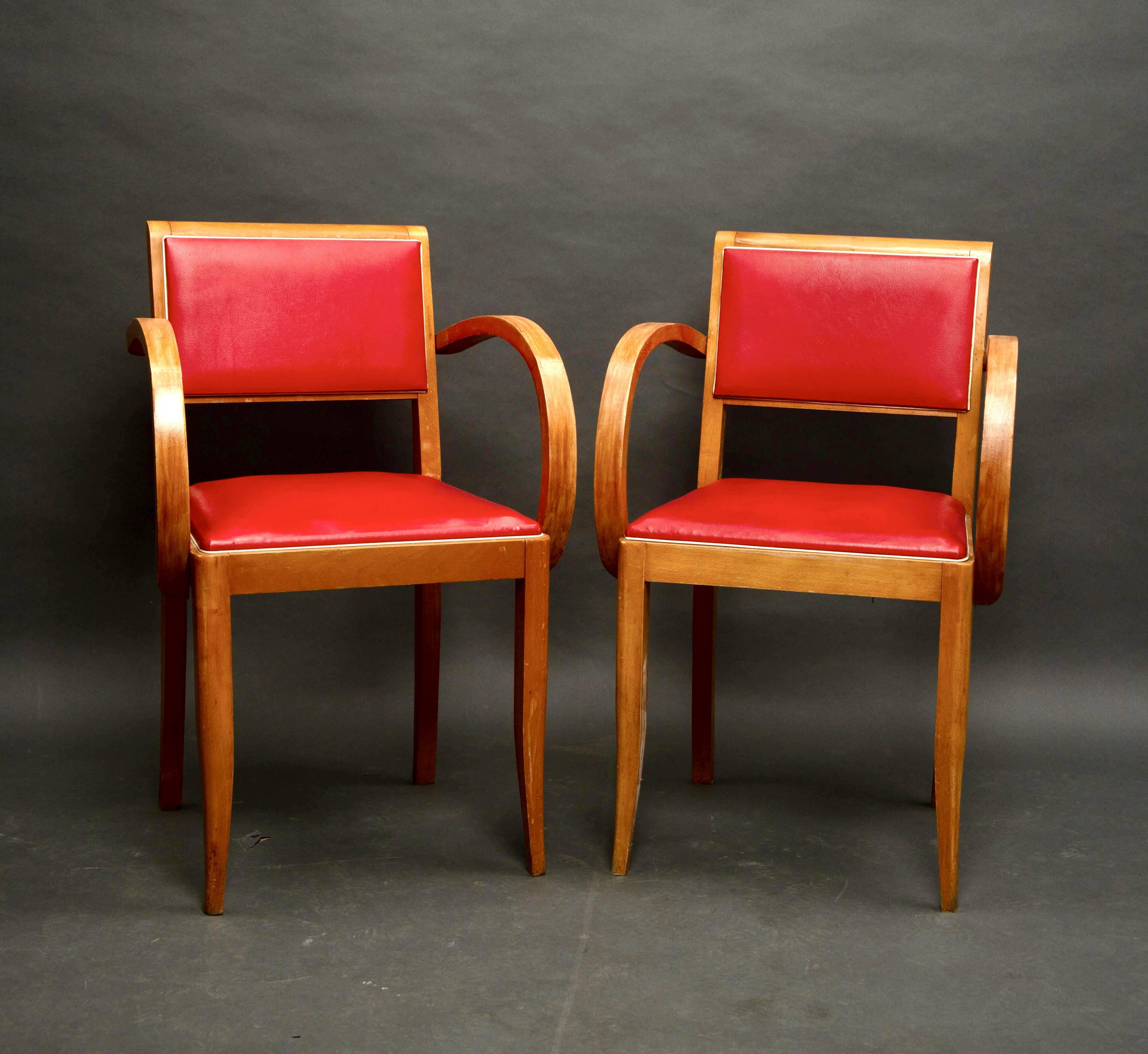 Pair of red bridge armchairs, 1950s