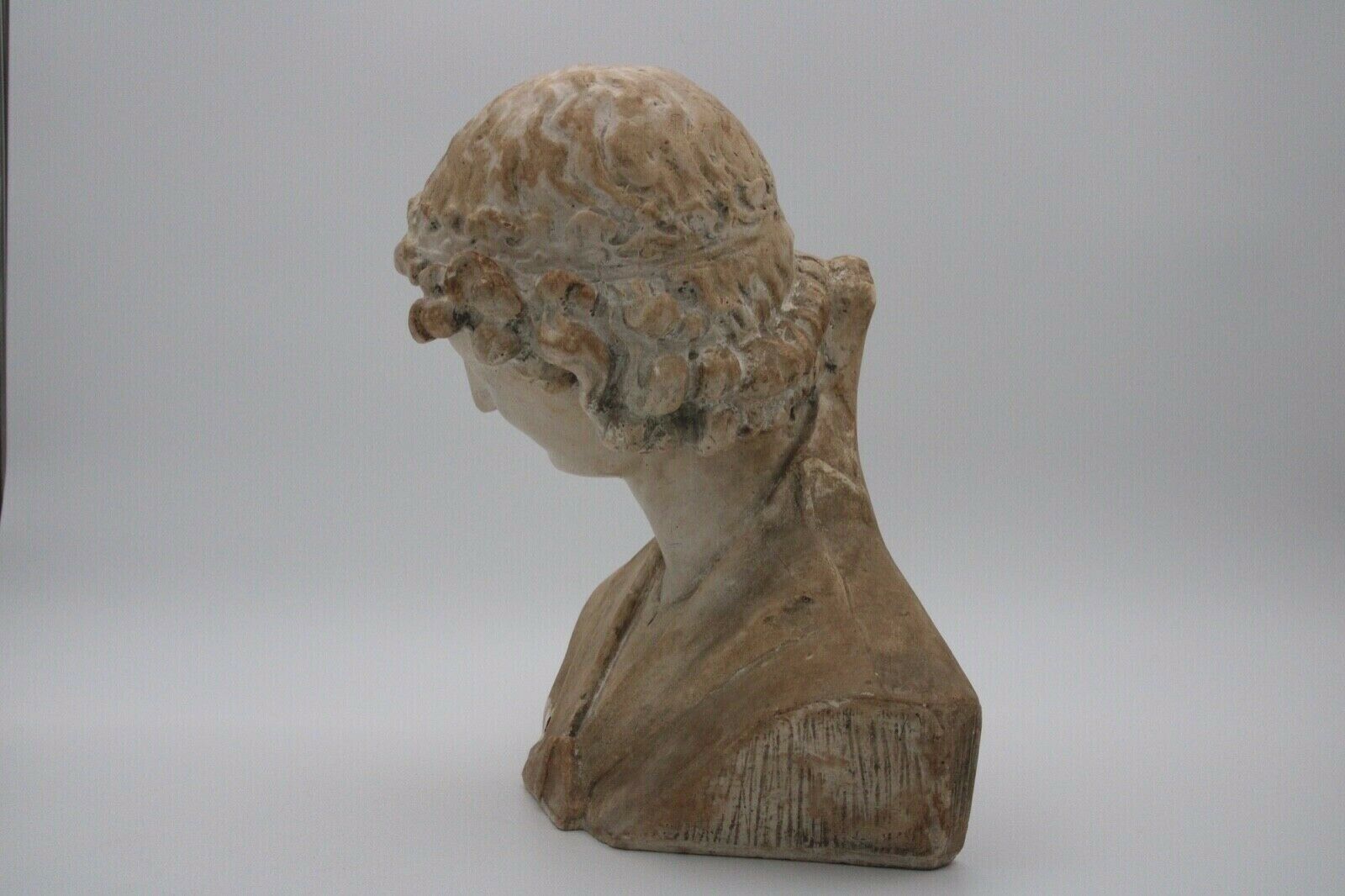 Bust in flat woman renaissance late 19th hair drapes