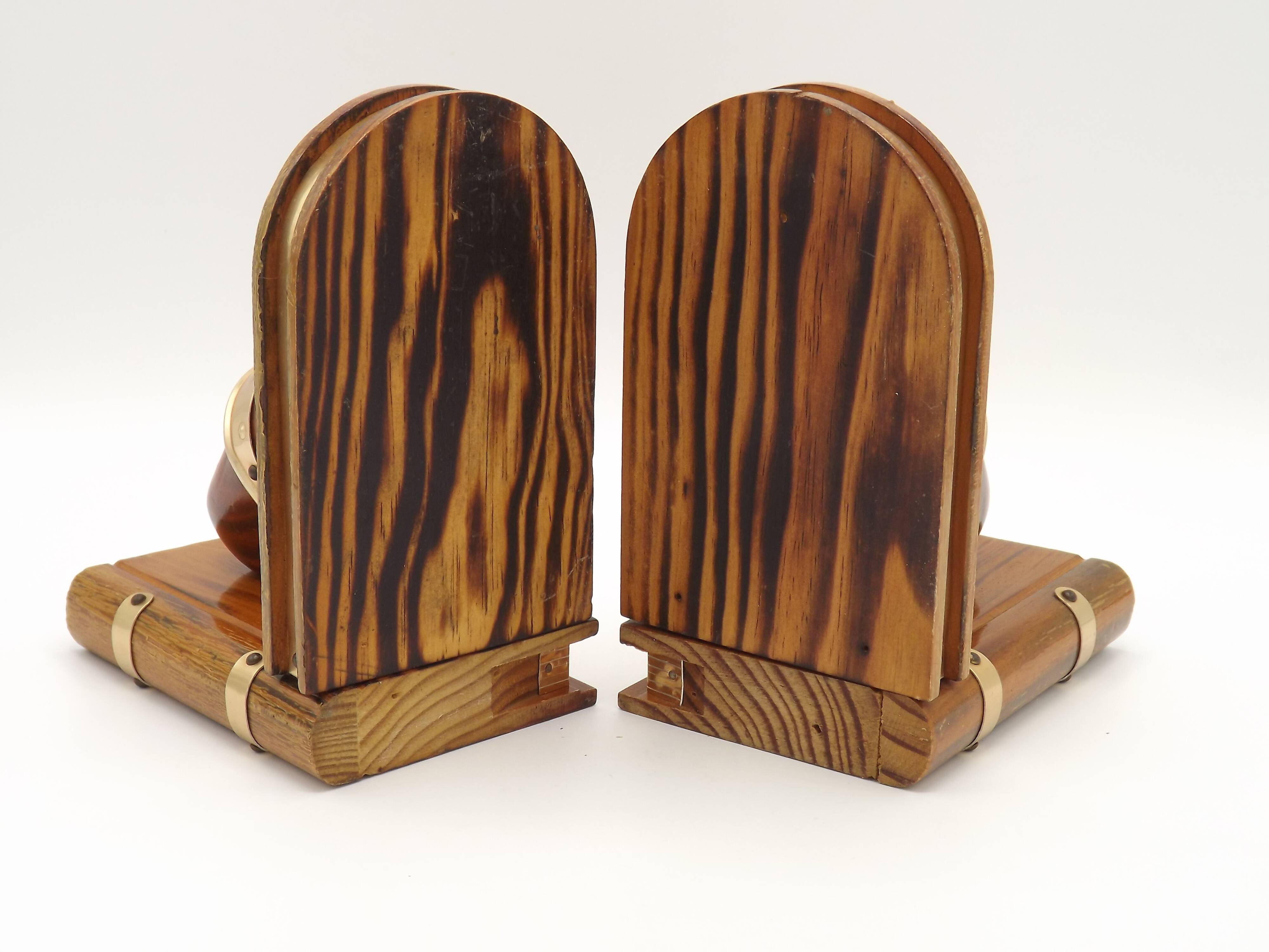 Vintage French Breton wooden bookends hand-carved with book and clog motif.
