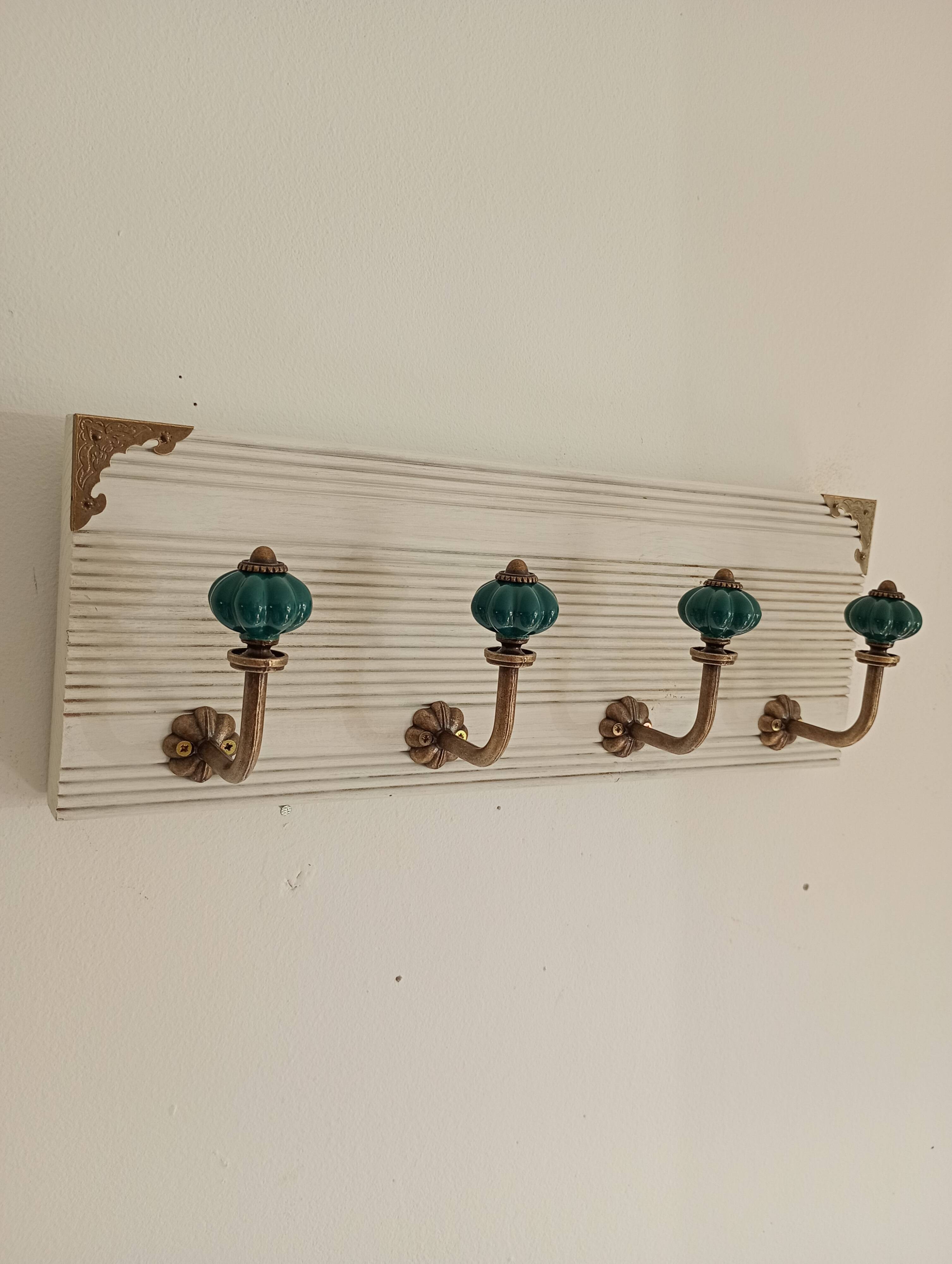 Wall-mounted coat rack in bleached wood and emerald green ceramic hooks –