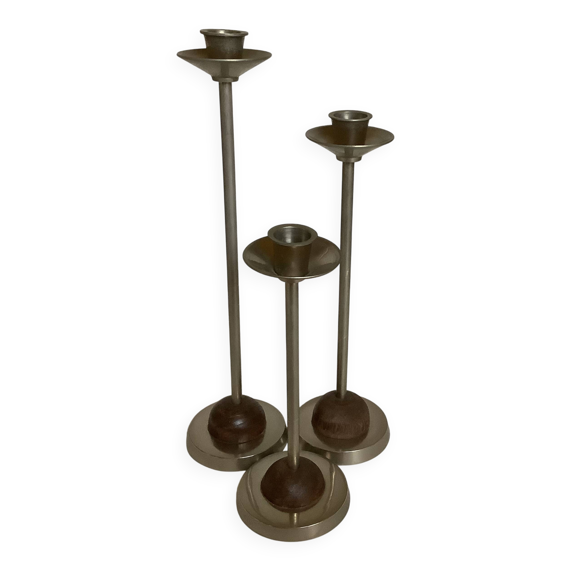Trio of metal and wood candlesticks