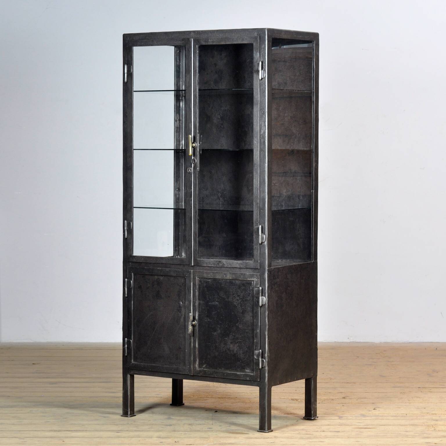 Polished iron medical cabinet, 1920s