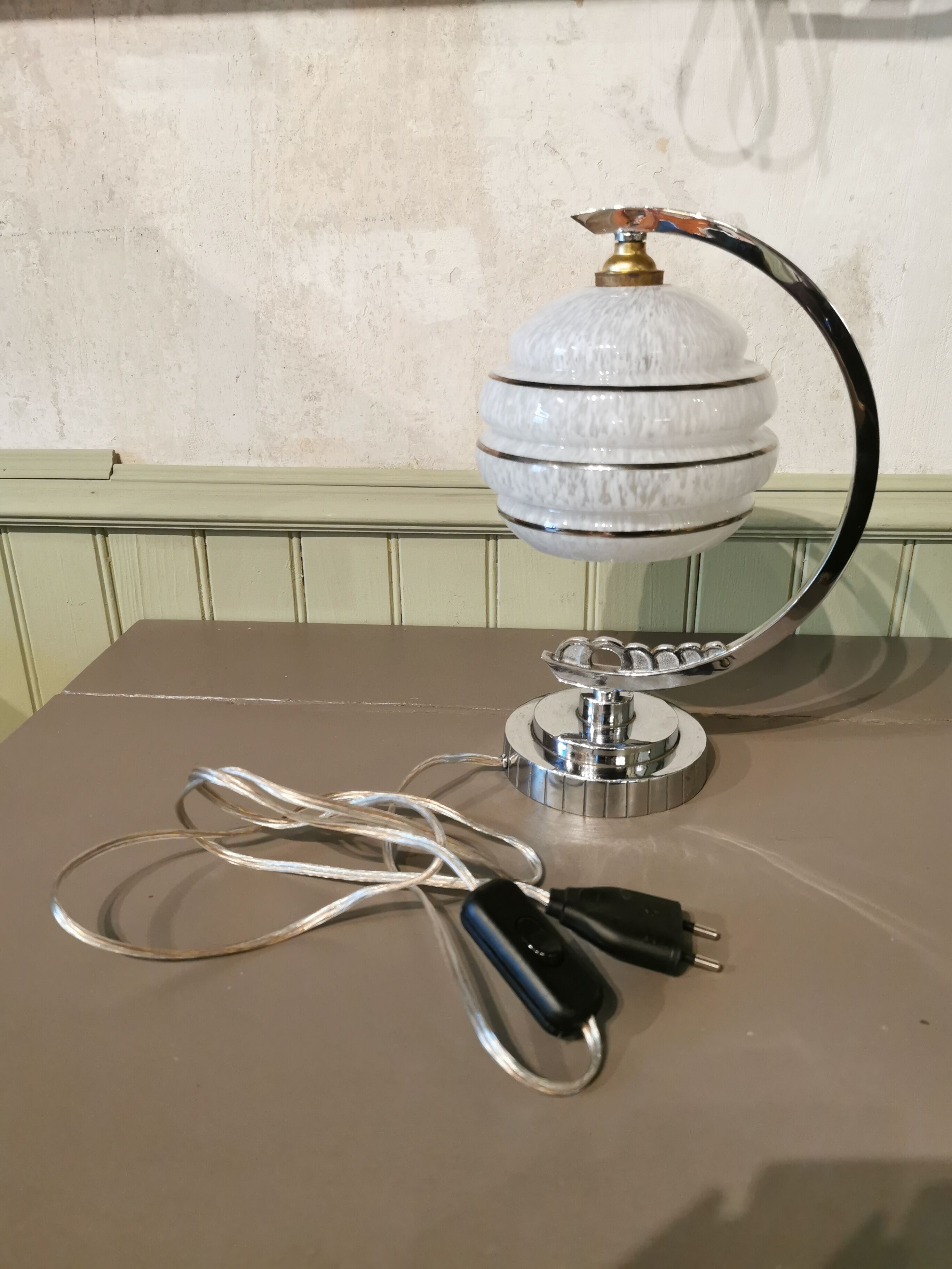 Half-moon chrome art deco lamp