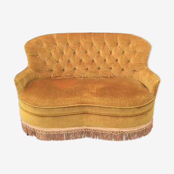 Banquette vintage en velours or