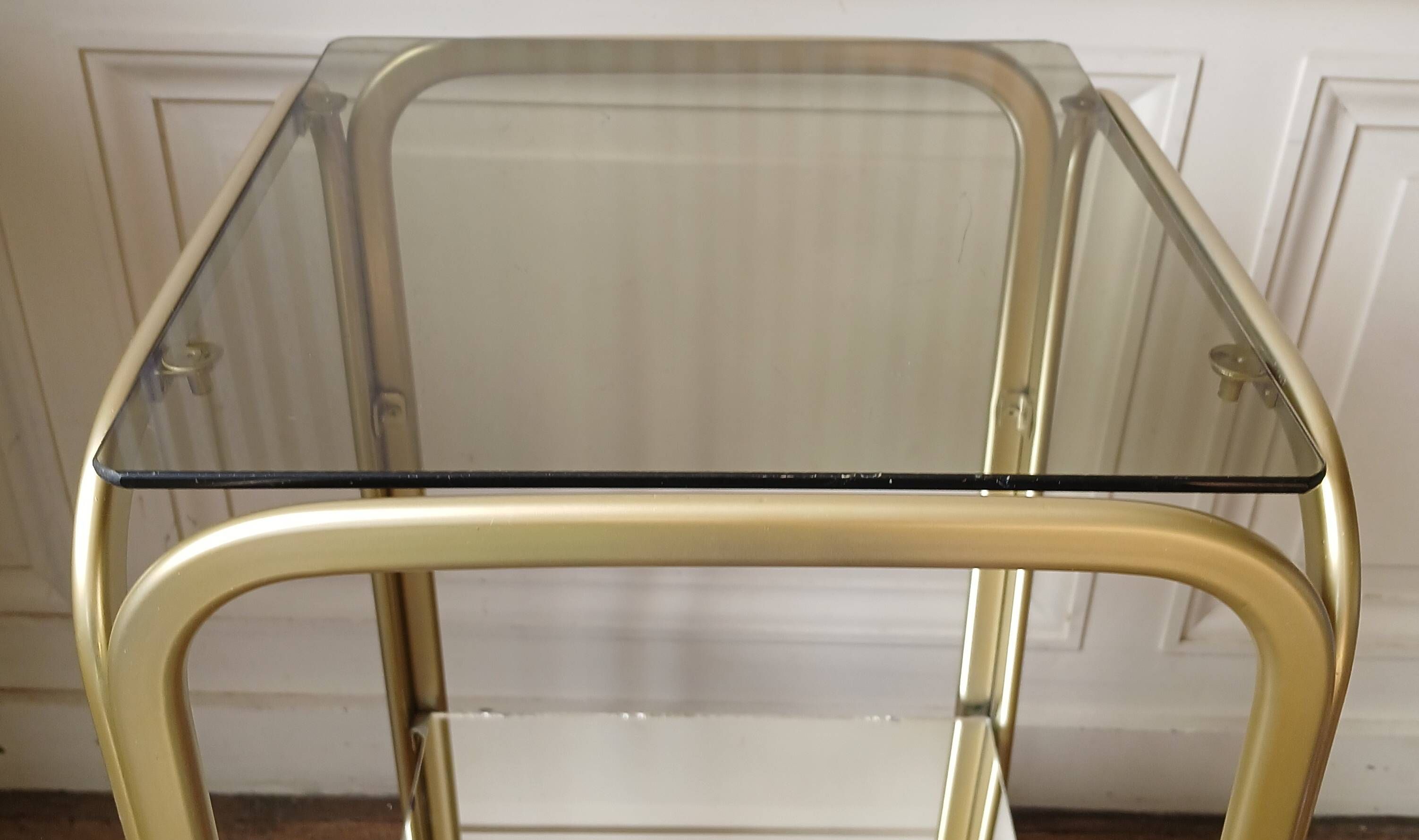 Bolster side table in gold metal, smoked glass & mirror Hollywood Regency 80's