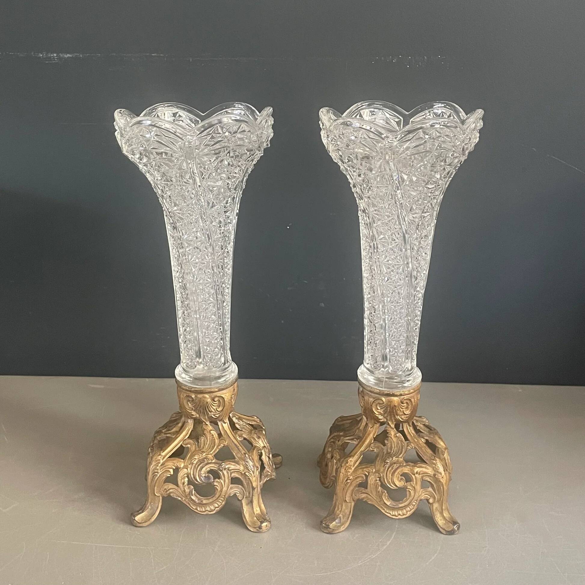Pair of candlesticks in spelter and moulded glass