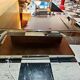Designer coffee table in glass and chrome metal.