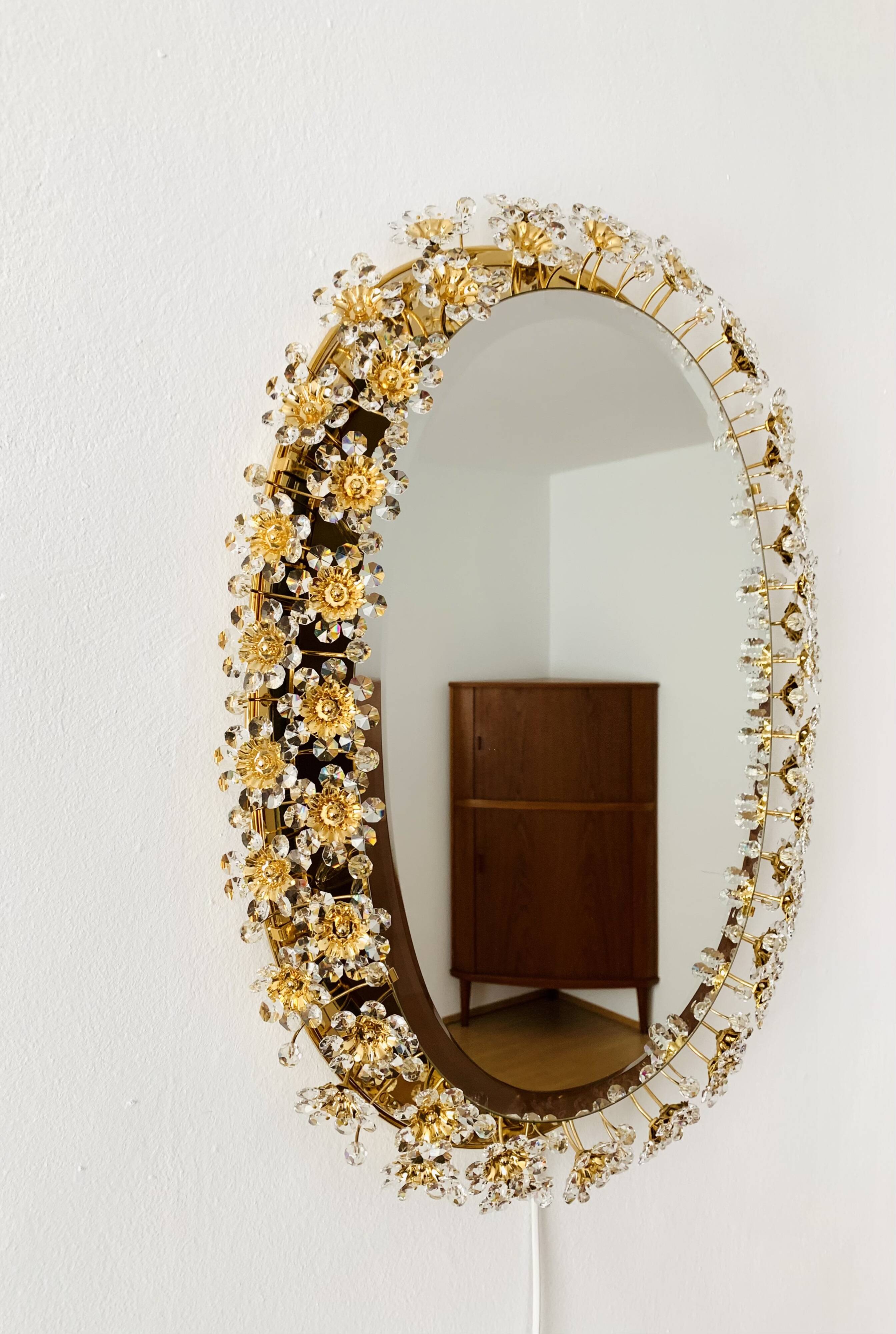 Illuminated floral mirror by Palwa