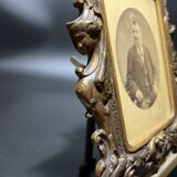 Old photograph of a man in a spelter frame