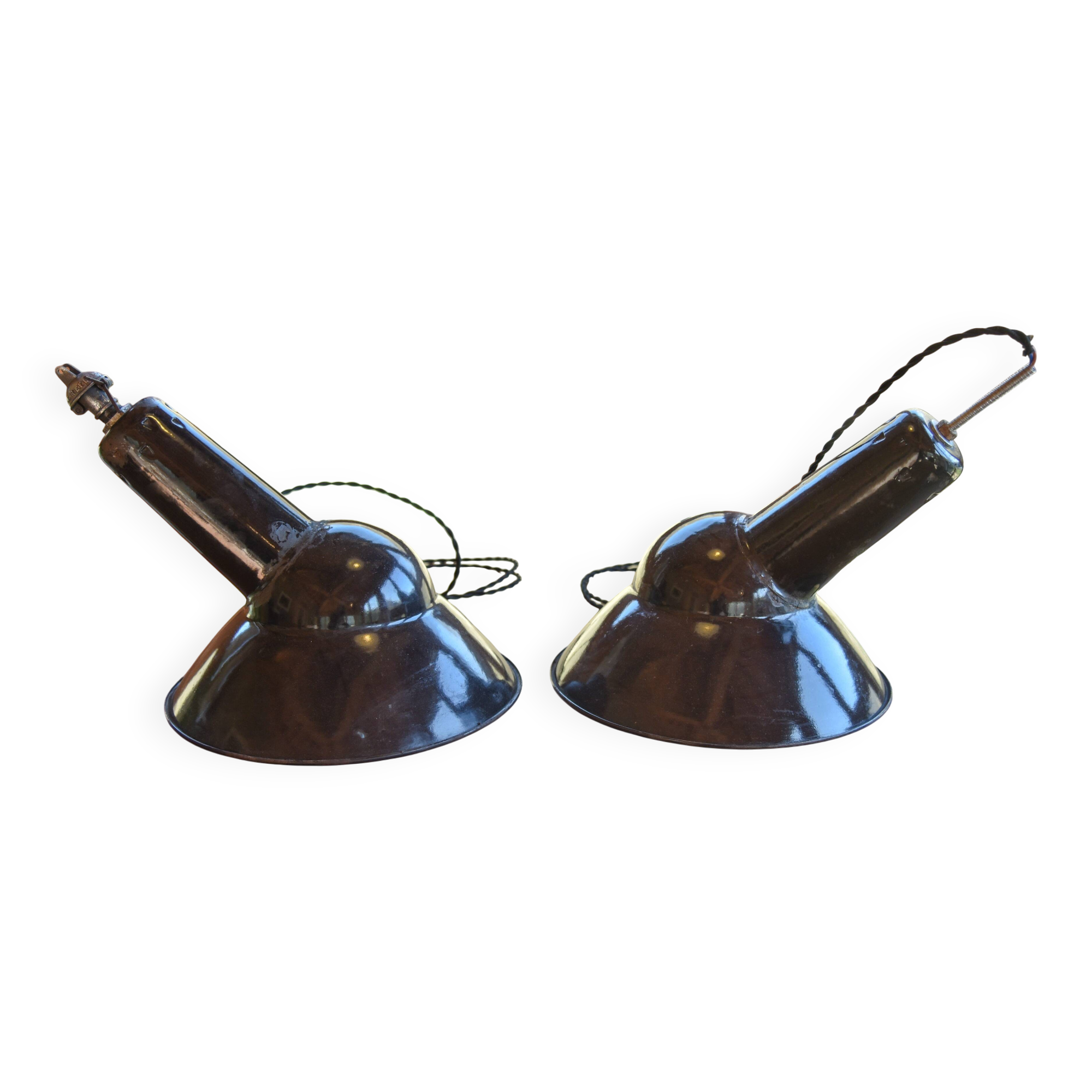 Pair of black enamelled sheet metal pendant lights from the 1950s.