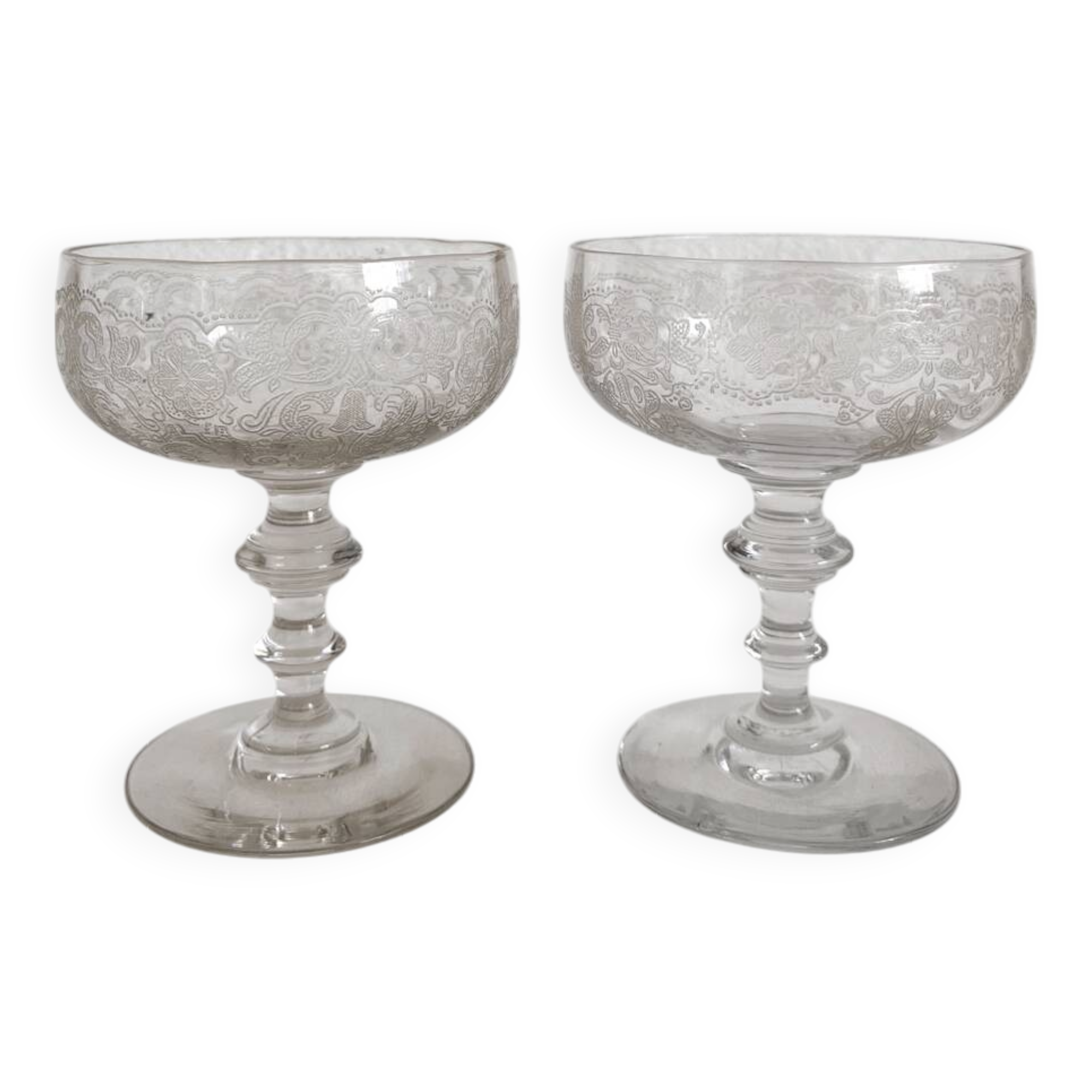 2 antique champagne glasses in engraved glass