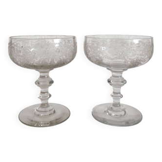 2 antique champagne glasses in engraved glass