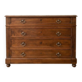 Antique wooden chest of drawers with a marble top.
