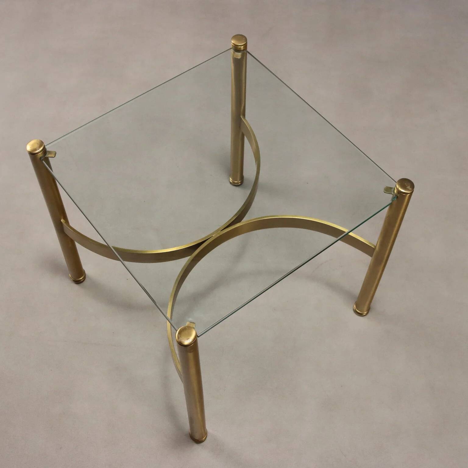 Vintage brass coffee table with glass top, Italian design from the 1970s.