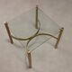 Vintage brass coffee table with glass top, Italian design from the 1970s.