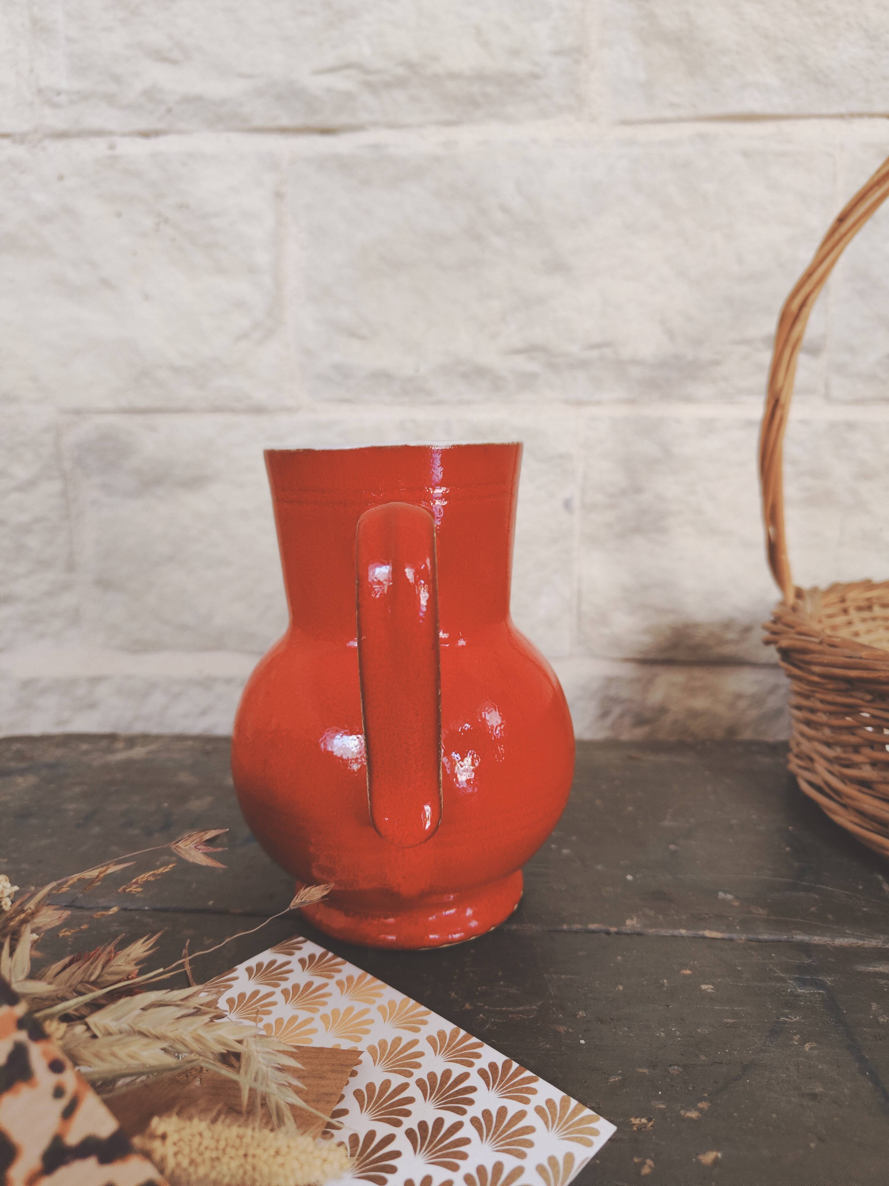 Small red enameled ceramic pitcher Emile Henry