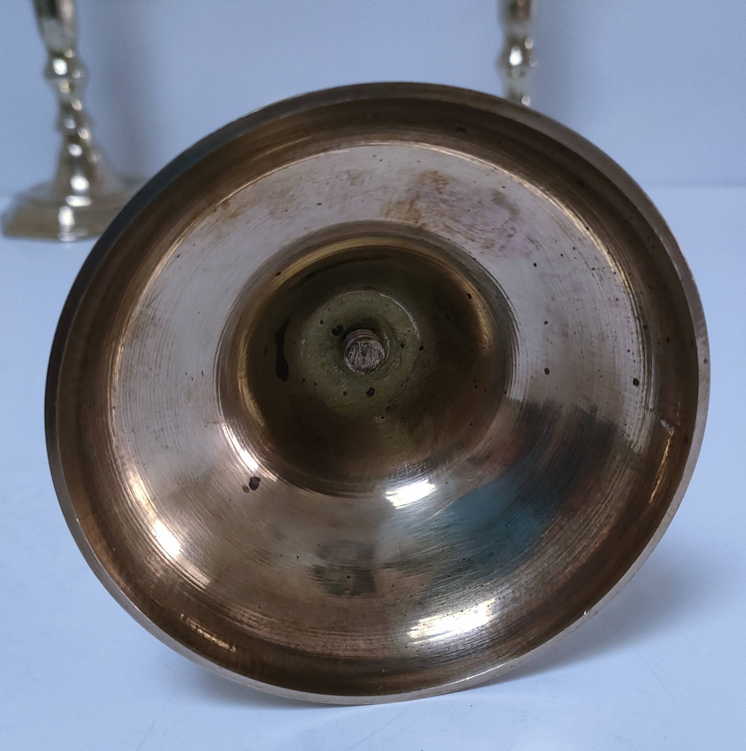 Three vintage solid brass candle holders