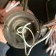 Paire d’appliques murales en verre rose et pampilles