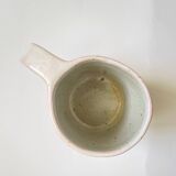 Handmade golden ceramic mug