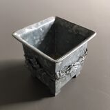Galvanized flowerpot with ivy decor