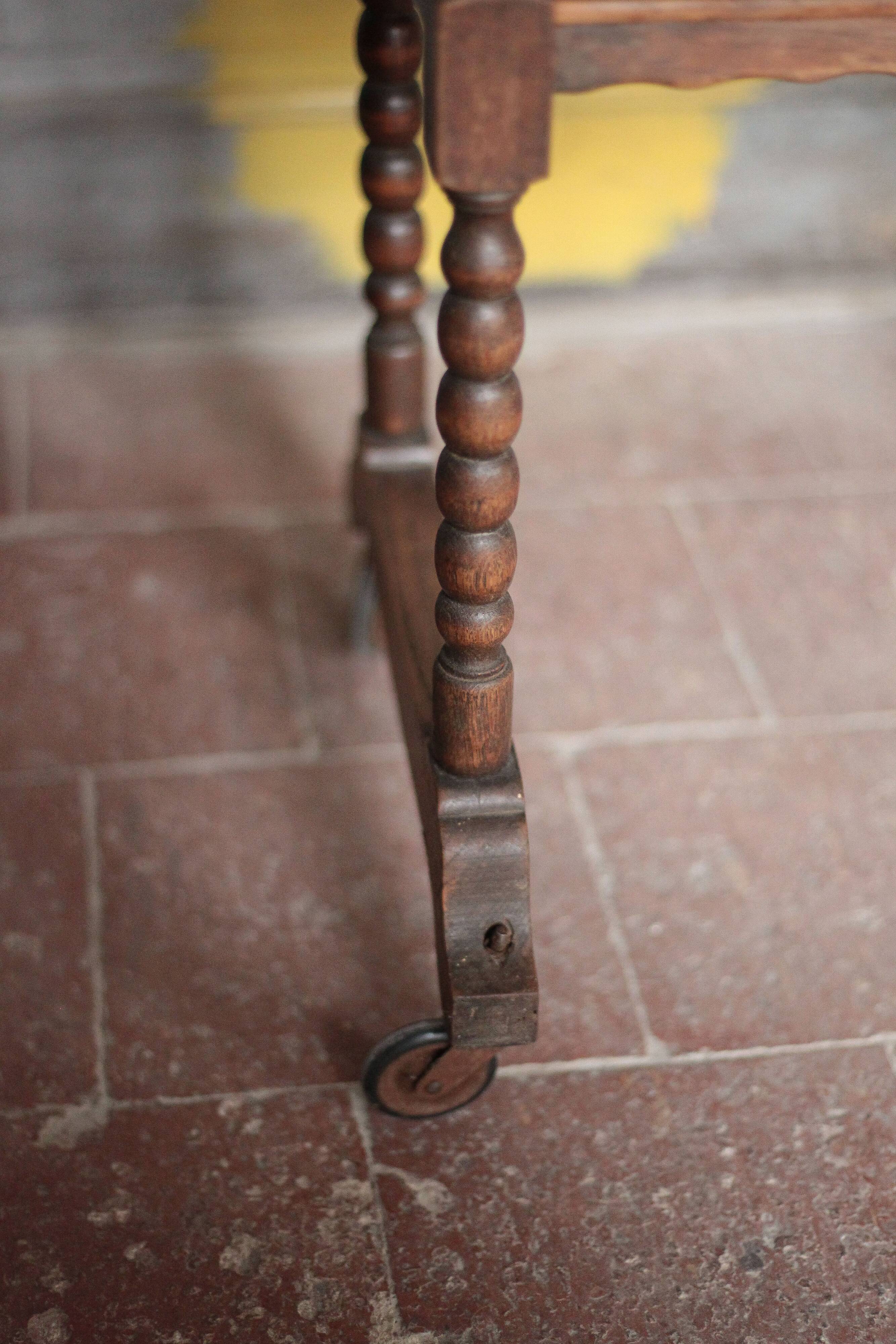 Vintage turned wood dessert trolley, wheeled table with removable top.