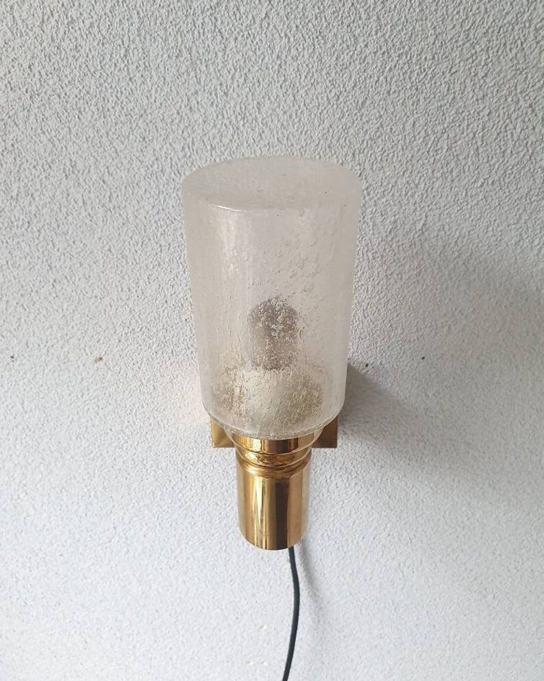 Brass applique with 1970 glass lampshade